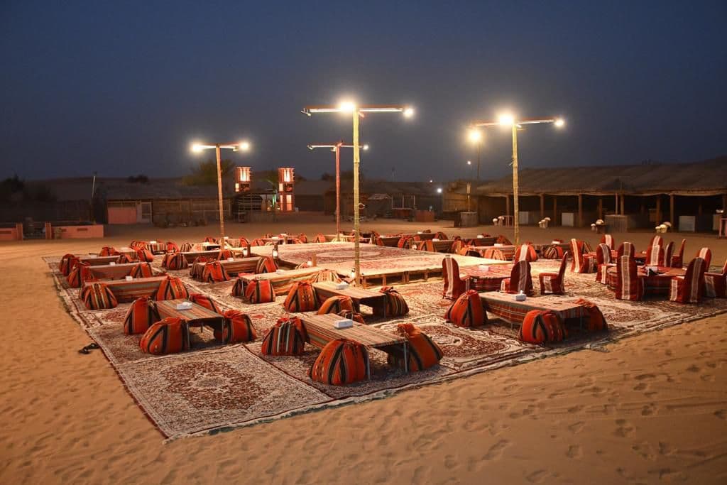 Low seating and woven carpets in the camp